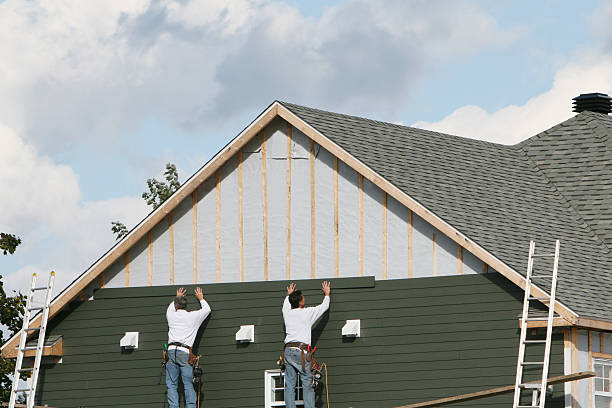 Professional Siding technician working in Queen Anne, MD
